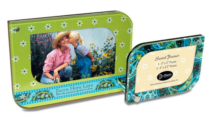 2 Swivel Frames. Heavy Glass panels. Each double frame holds (1) 5" x 3" photo and (1) 4" x 2. 5" photo. Packaged in a white gift box. Features Scripture: 1 Corinthians 13:13. Material: Glass.